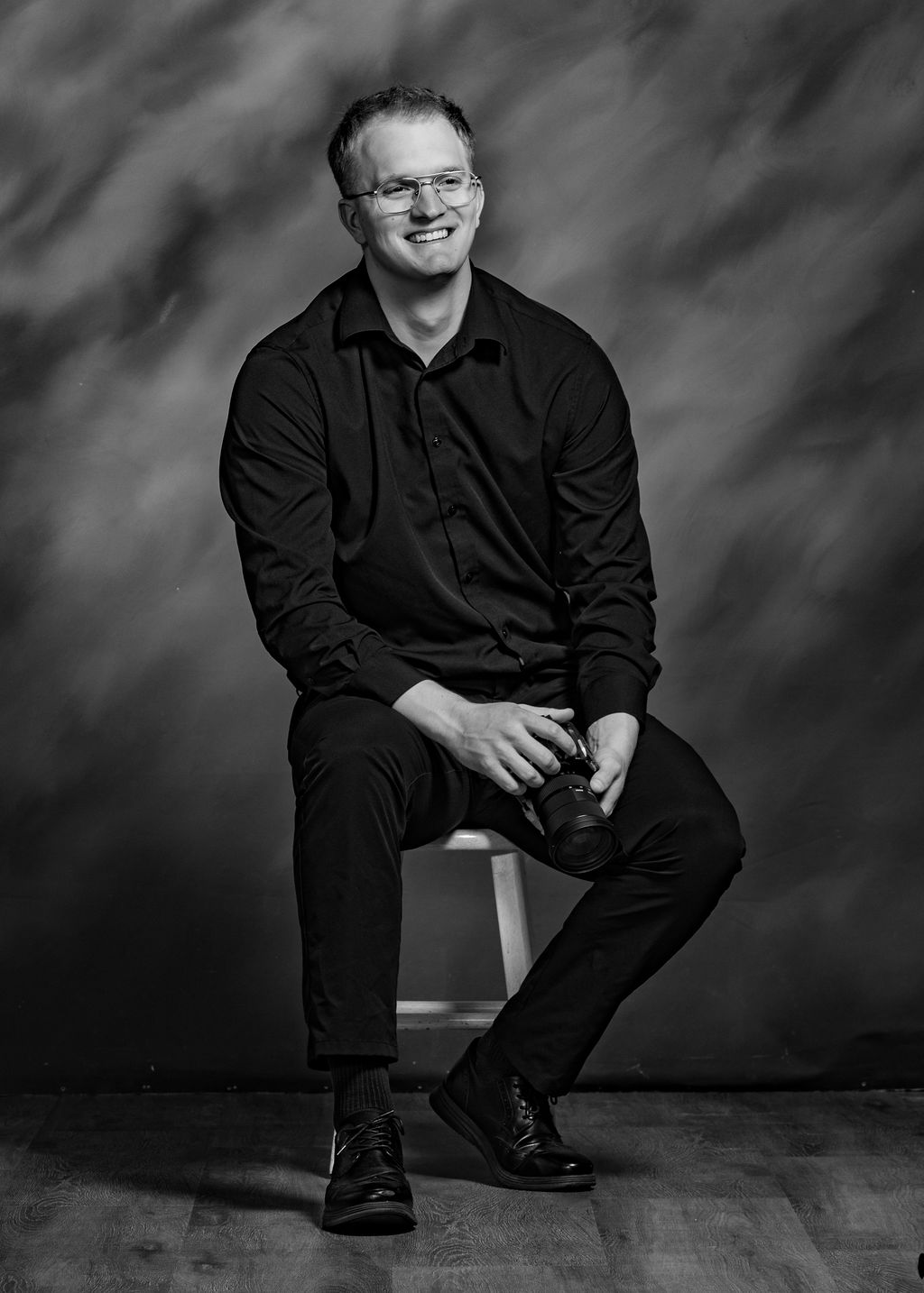 Nick Carter, filmmaker at Flashback Media, holding a camera