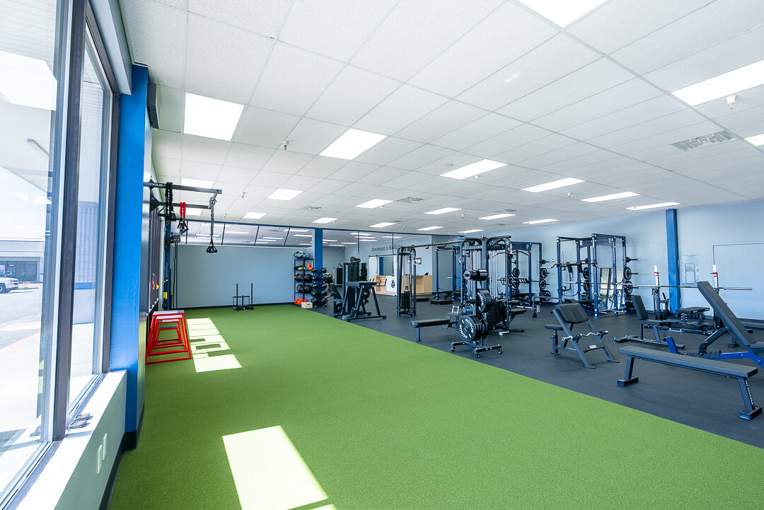 The Physio Shop main gym floor with power racks